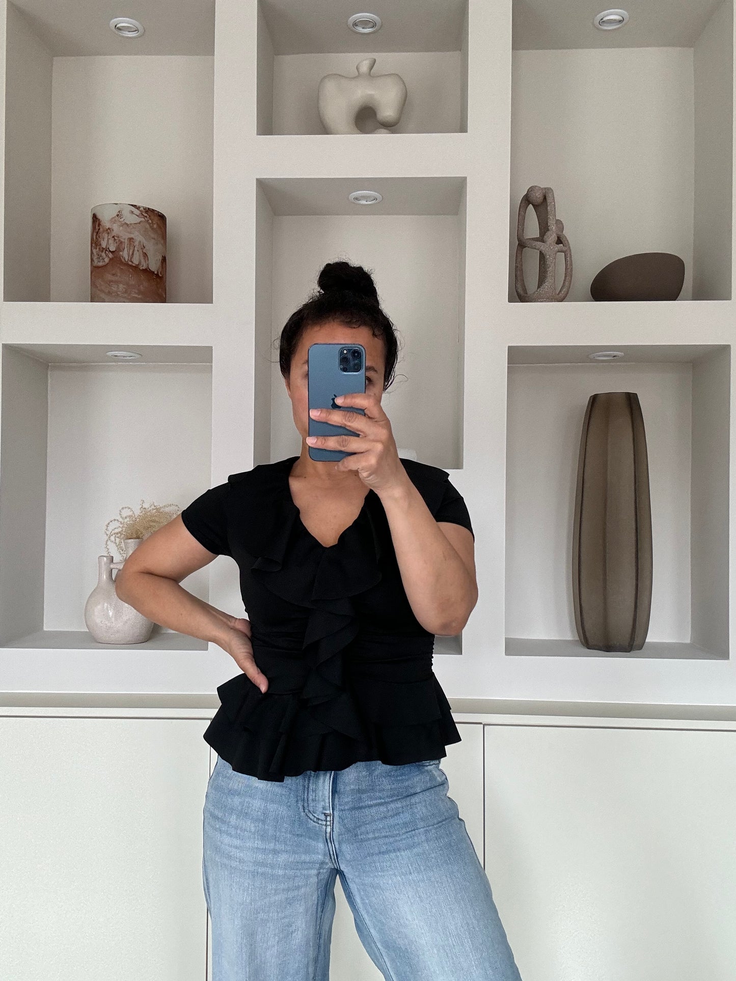 Ruffle black top